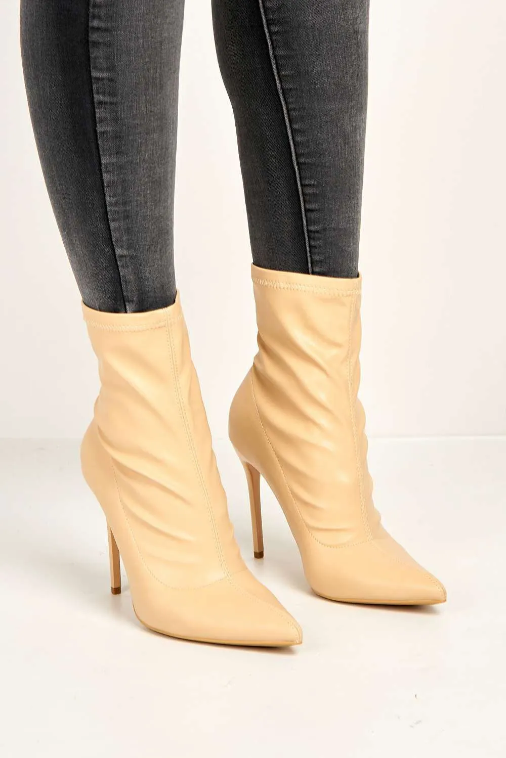 Eless Pointed Toe Stiletto Heeled Ankle Boots in Nude Matt