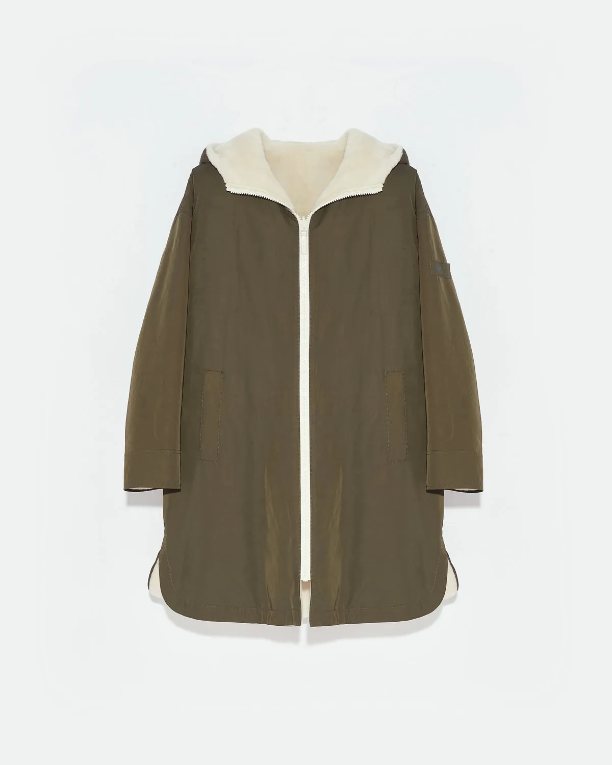 Reversible parka in water-repellent technical fabric and shearling