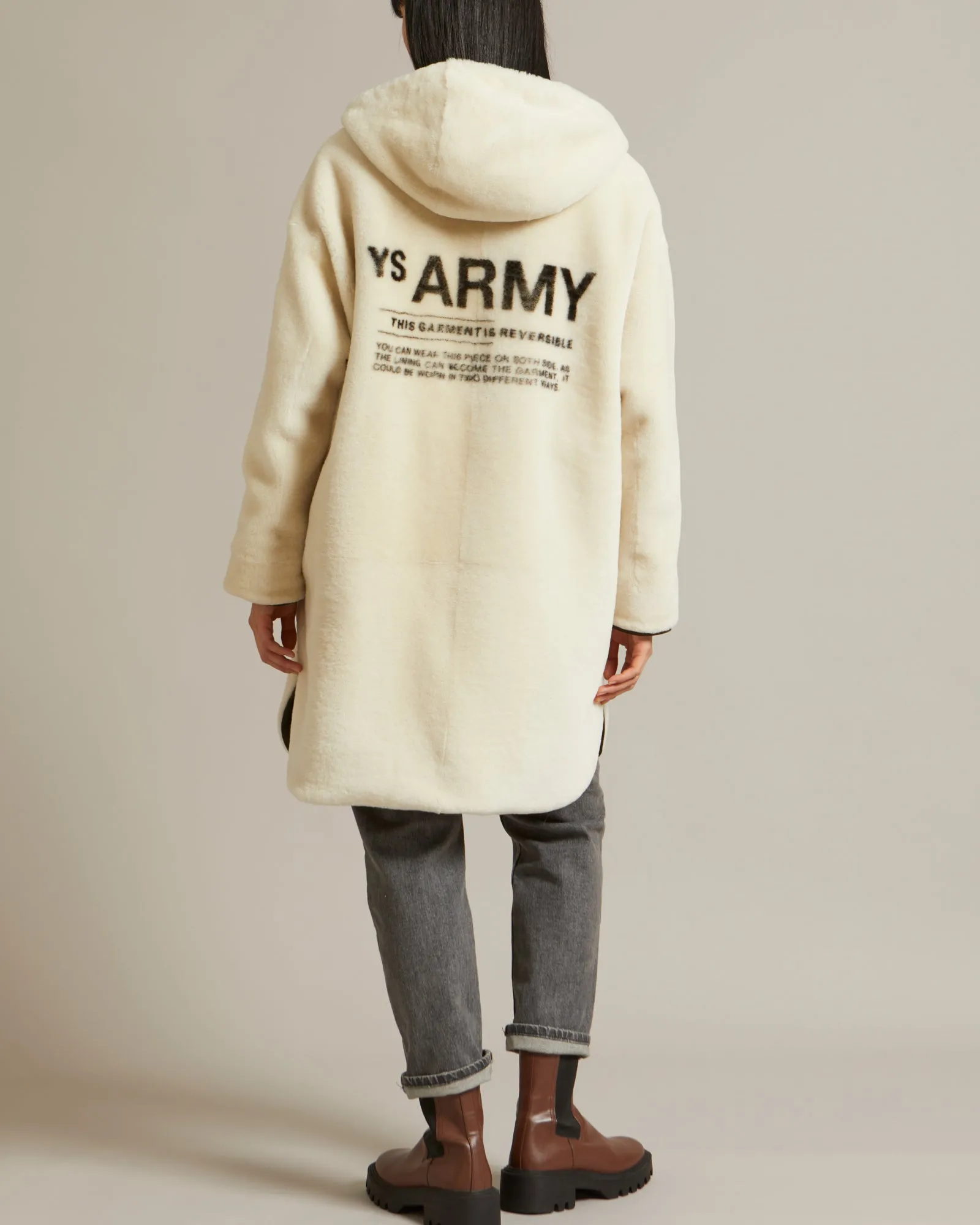 Reversible parka in water-repellent technical fabric and shearling