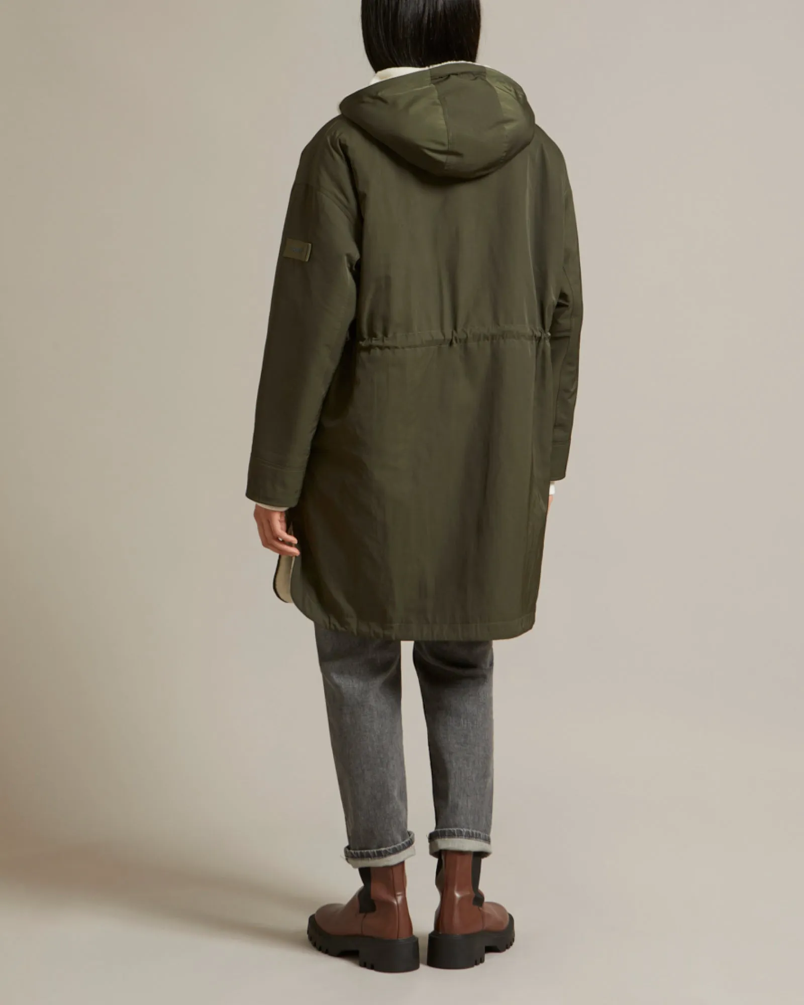 Reversible parka in water-repellent technical fabric and shearling